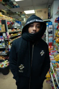 Top streetwear brands style by The 1010 Boys in a black urban winter outfit.