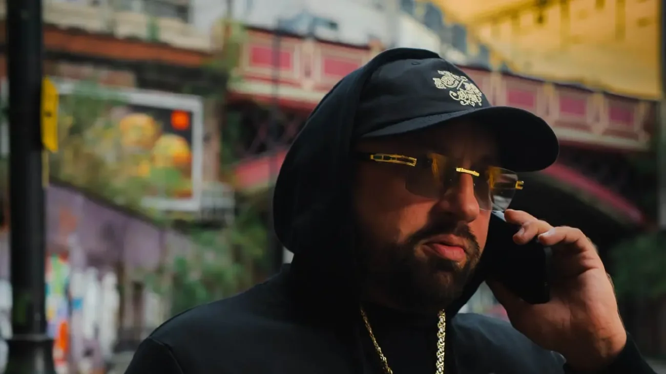 Streetwear cap styled with a hoodie and cargo trousers