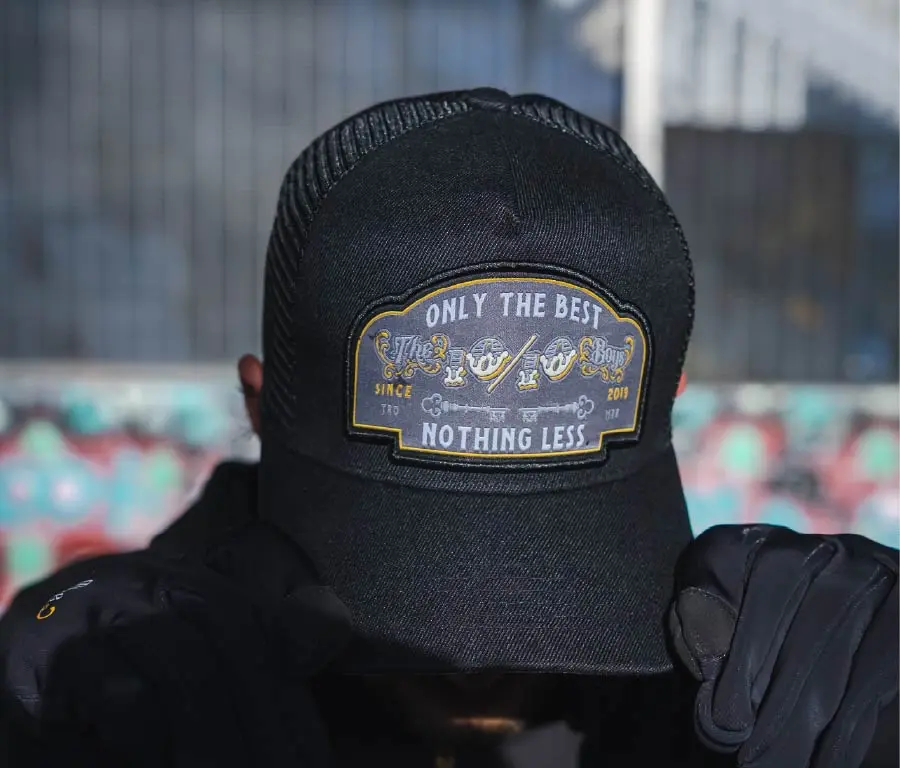 Neutral streetwear outfit finished with a black cap