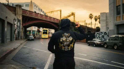 The 10/10 Boys hoodie in an urban setting representing an LA streetwear brand inspired by California culture