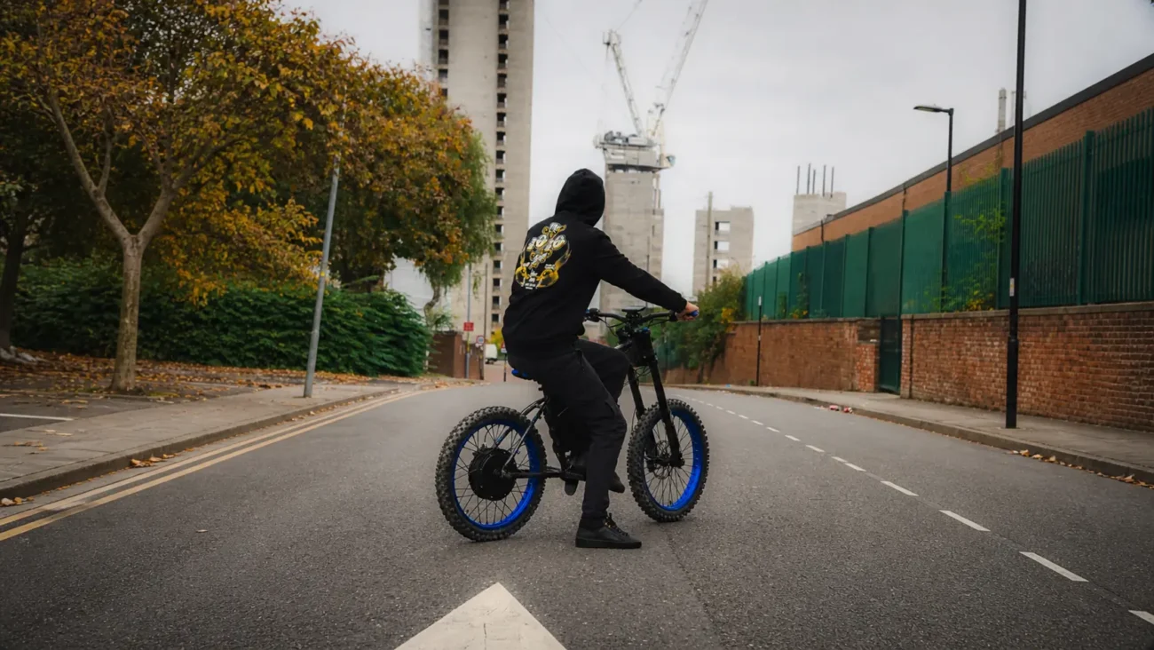 Bikelife Birmingham rider wearing The 10/10 Boys streetwear on an electric bike