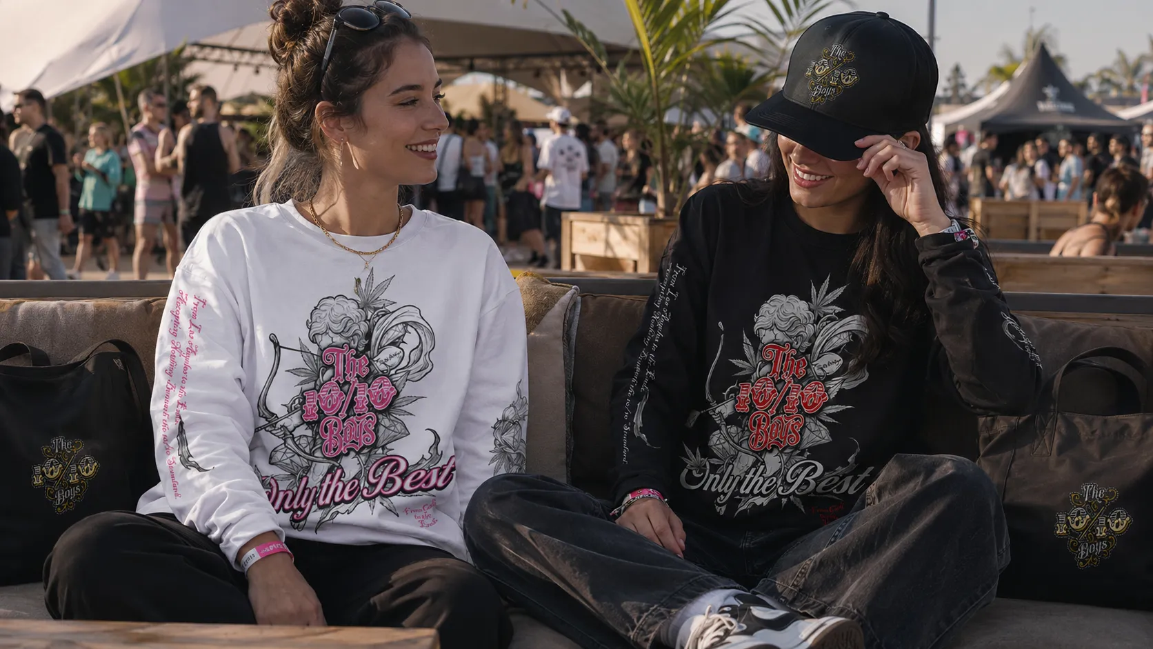 Two festival-goers in The 10/10 Boys long-sleeve streetwear tops and caps relaxing on a sofa at a cannabis festival