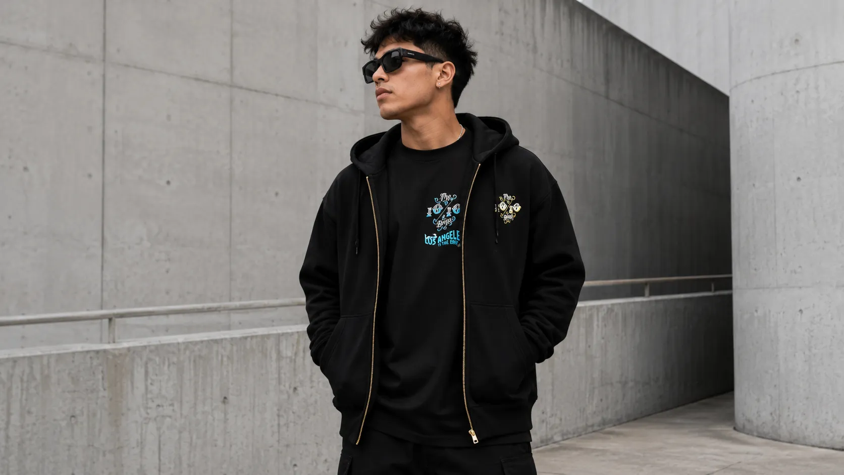 Premium hoodie fit layered over an everyday t-shirt on a male model in an urban setting