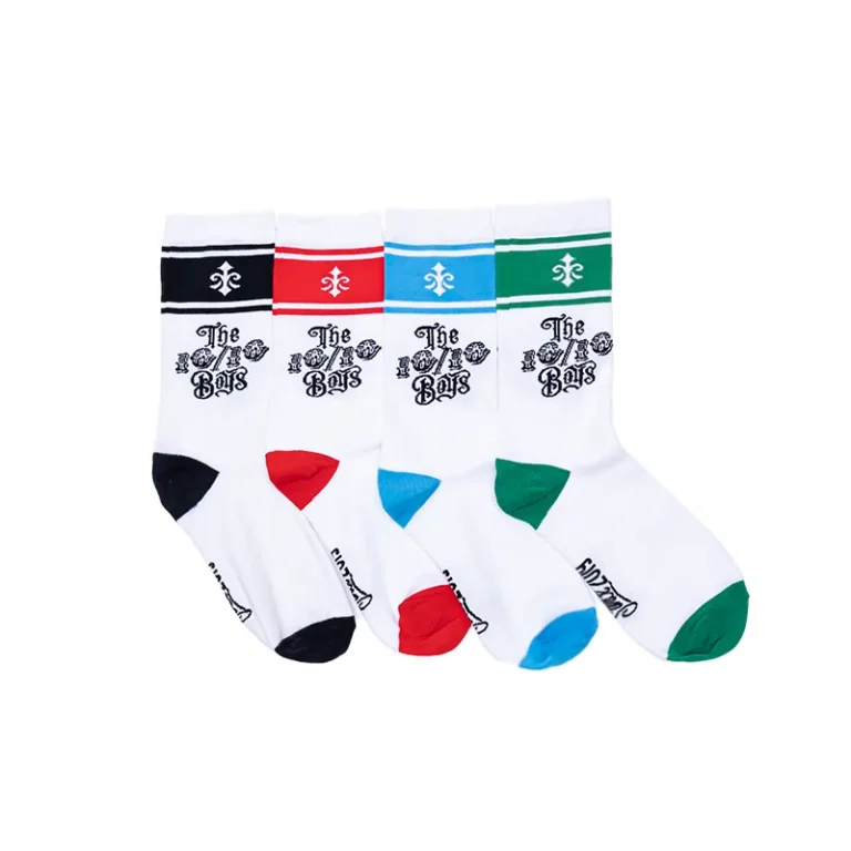 The 10/10 Boys sock multi pack laid out — four pairs with fleur-de-lis cuff detailing