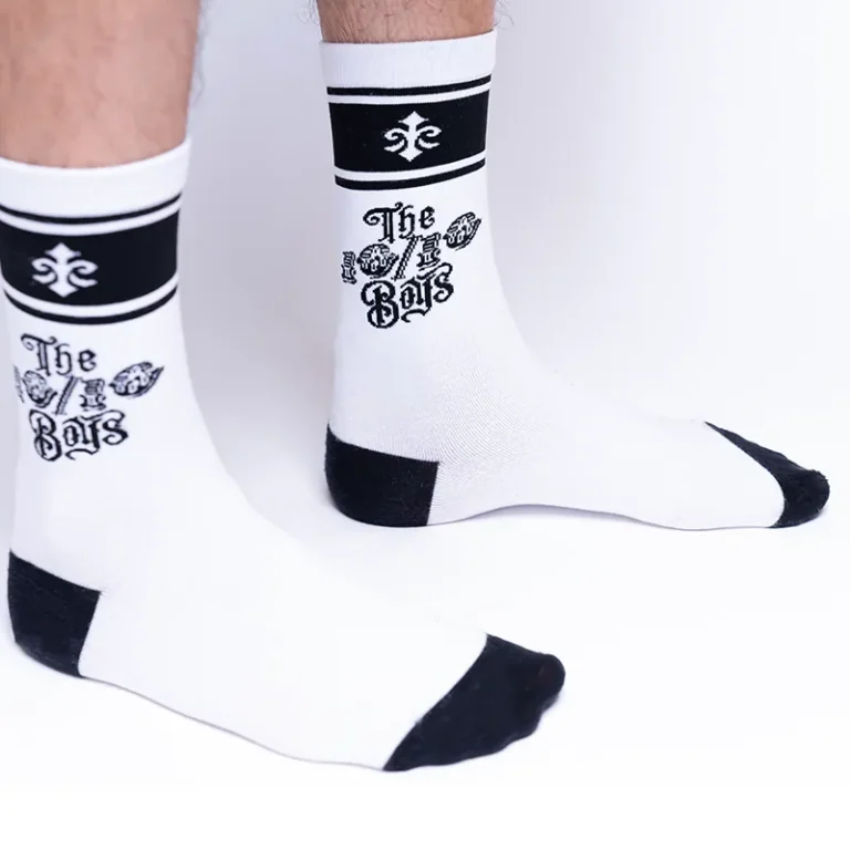 The 10/10 Boys Black Socks worn — pair shown with black cuff bands and 10/10 Boys logo
