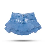 The 10/10 Boys denim skirt — front view of the light-wash tiered mini