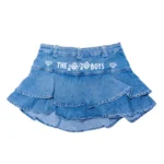 The 10/10 Boys denim skirt — back view of the layered denim mini skirt