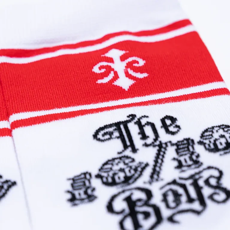 The 10/10 Boys Red Socks — side view showing the gothic 10/10 Boys logo