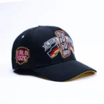 10/10 Boys Berlin limited-edition snapback with German flag accents and gold detailing