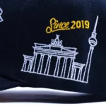 10/10 Boys Berlin limited-edition snapback with German flag accents and gold detailing