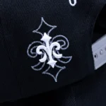 10/10 Boys Chrome ZeeZee black snapback with gothic embroidery and chrome detailing