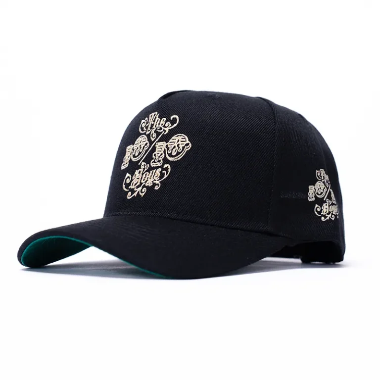 The 10/10 Boys OG Snapback in black — three-quarter front view showing the chest logo and matching side embroidery