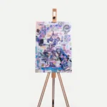 The 10/10 Medium Canvas by GavinBrownArt on an easel, showing its portrait format and scale