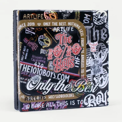 Stick It Art Mini Canvas No. 1 by GavinBrownArt: sticker-covered 10/10 Boys logo in a gold frame, front view
