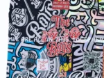 Detail of Mini Canvas No. 2: The 10/10 Boys logo, We are all in this together and a QR code
