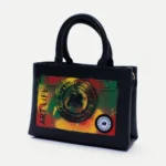 The ArtLife side of the 10/10 × ArtLife Medium Box Bag, sprayed in red, yellow and green