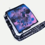 The 10/10 Purse with its THE1010BOYS.COM lanyard, showing the sprayed pink and blue back