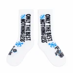 The 10/10 Boys Only The Best Sock — pair laid flat, ONLY THE BEST, NOTHING LESS down the leg and the logo on the foot